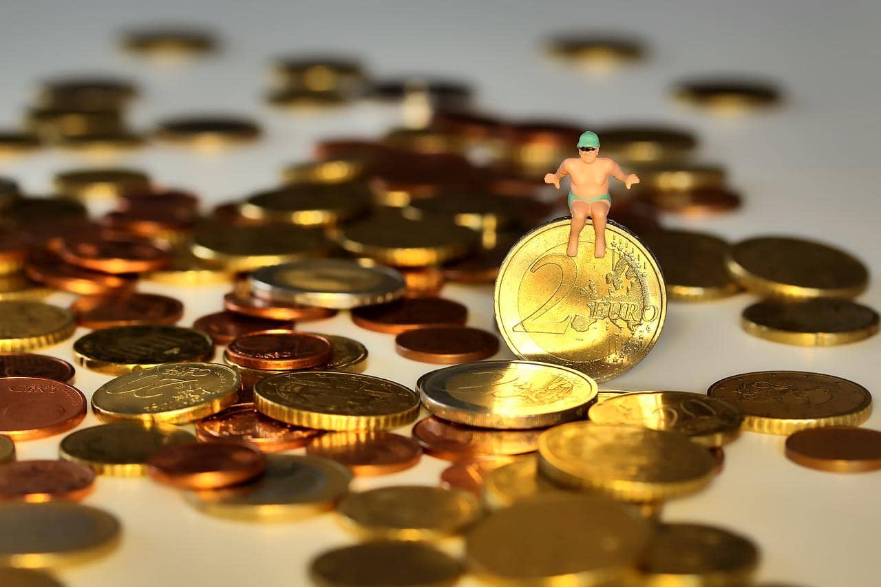 Imagem representando o PGBL, mostrando moedas e dinheiro